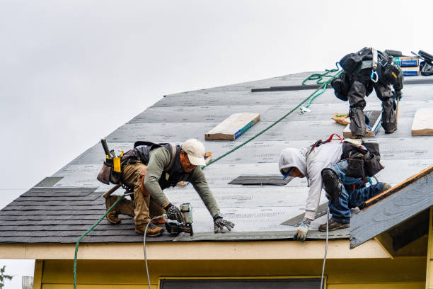 Professional Gutter Installation technician working in Wellston, MO